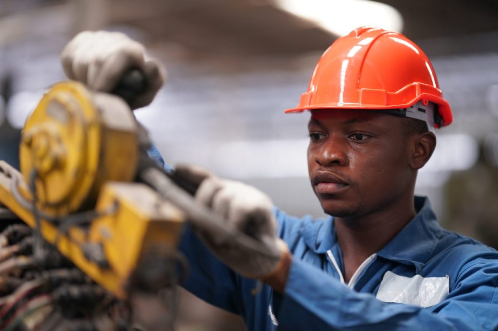 industrial-factory-employee-working-in-metal-manufacturing-industry.jpg